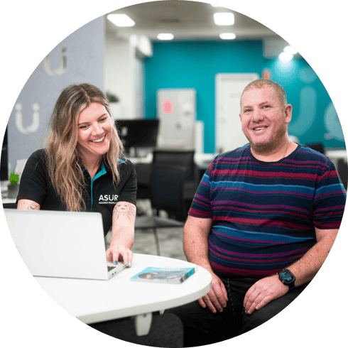 2 - Computer and looking at camera